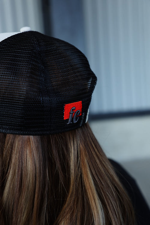 Beige Forever Classic baseball cap with flat out or go home text and adjustable back closure