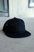 Forever Classic black snapback cap with flat brim, mesh back and adjustable closure