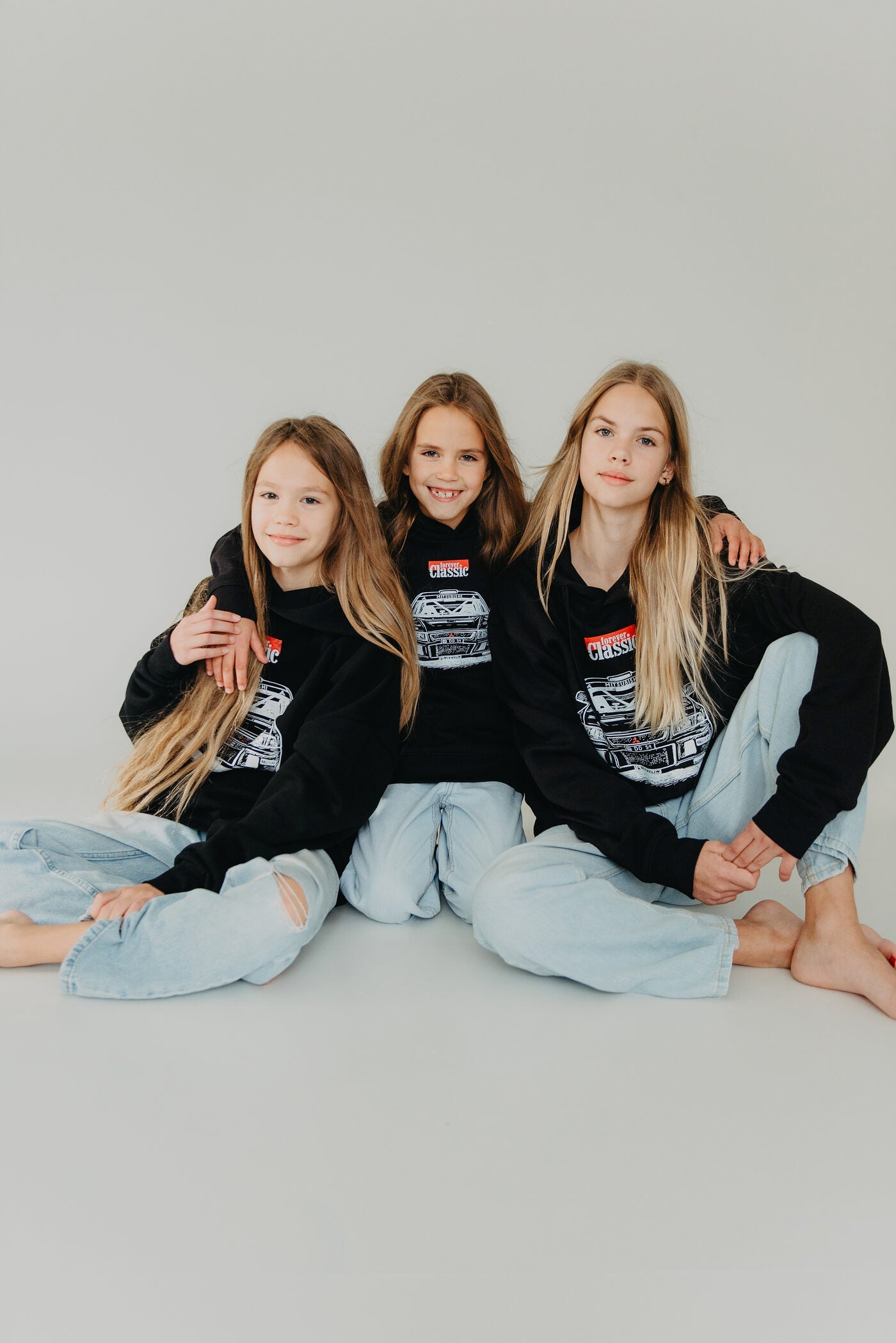 Black kids' hoodie in soft cotton with Forever Classic motorsport style design