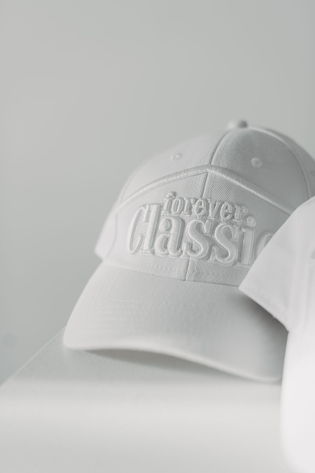 Forever Classic white baseball cap with brim and adjustable closure for everyday wear
