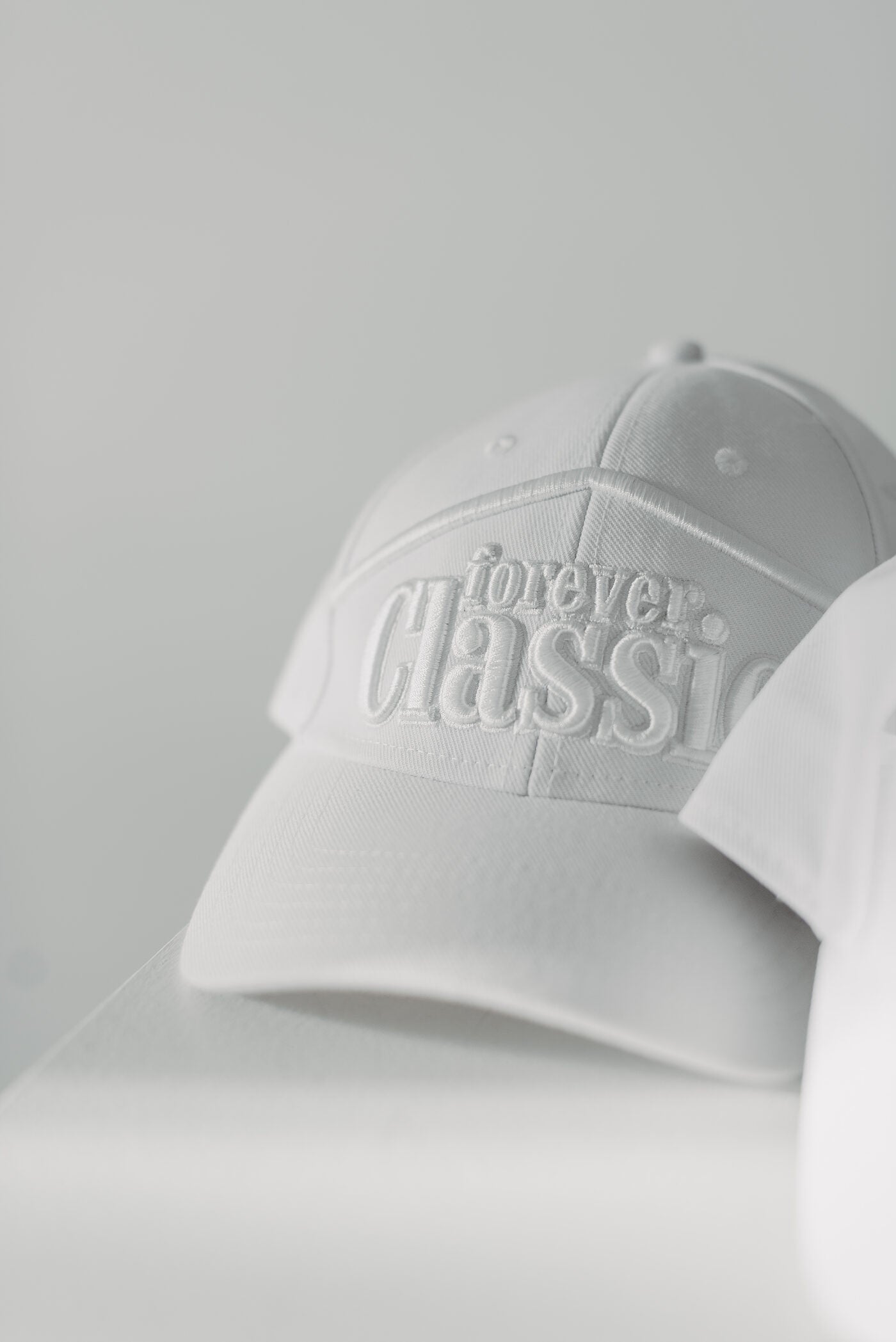Forever Classic white baseball cap with brim and adjustable closure for everyday wear